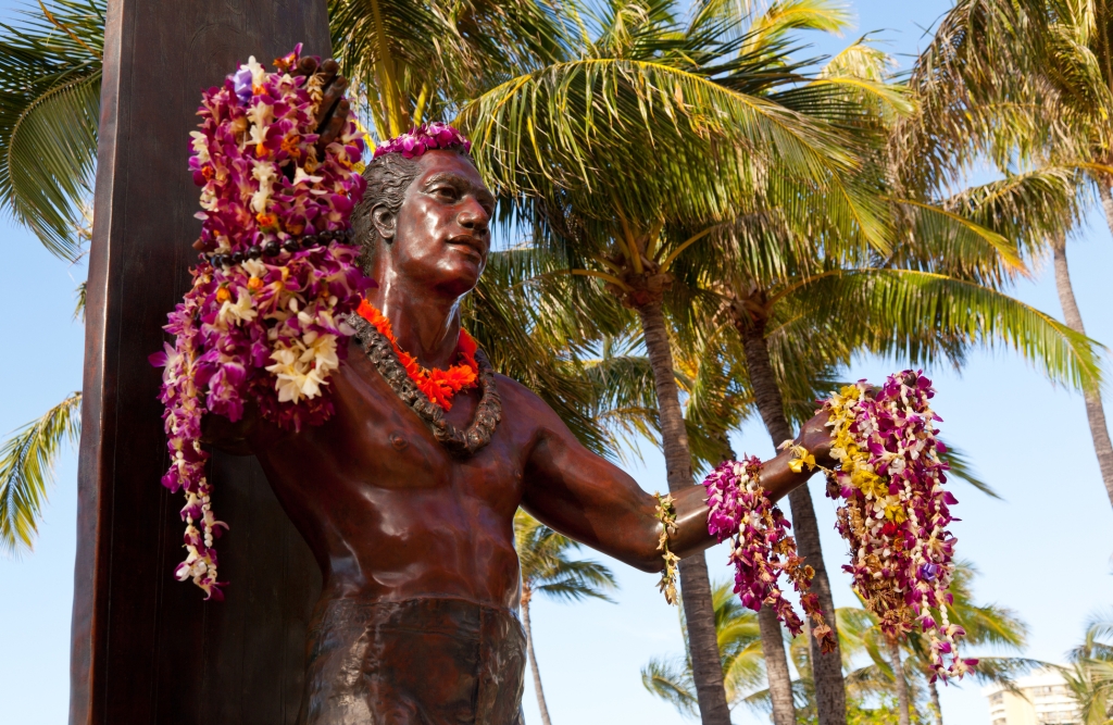 Statue of famous surfer Duke Kahanamoku on Waikiki beach in Hawaii